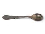 silver spoon on a white background with a spoon in the middle