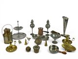 many different types of silverware on a white surface