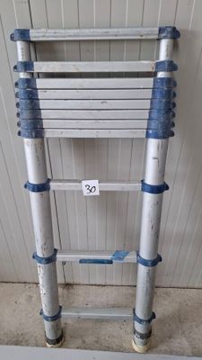a ladder that is leaning up against a wall