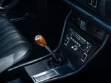 a close up of a car ' s interior with a gear stick