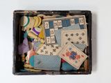 a small box filled with different types of sewing supplies