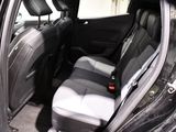 a car that has two seats in the back of it