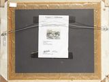 a picture of a picture hanging on a wall with a piece of paper