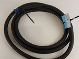 a close up of a cable connected to a white surface