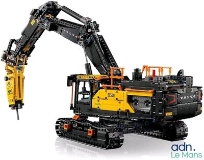 a lego model of a construction vehicle with a crane