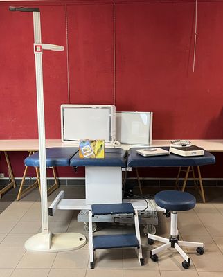 an image of a room with a desk and a chair
