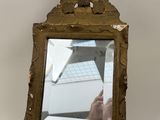 a mirror that is sitting on a table