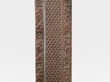 an old wooden door with carvings and carvings on it