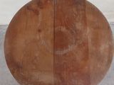 an image of a wooden table with a tag on it