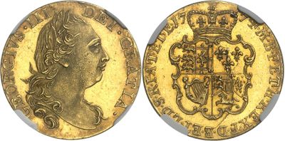 a gold sovereign coin with a crown on top of it