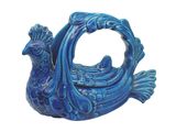 a blue bird with a ring on it ' s head