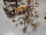 a table with a bunch of chairs and a chandelier