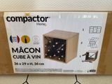 a cardboard box with a bunch of wine bottles inside of it
