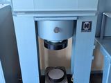 a machine that is sitting in the corner of a room
