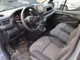 a car with a steering wheel and a dash board