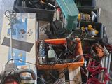 a pile of assorted items sitting on the floor