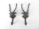 pair of cast iron deer head hooks