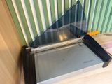 a glass door that is open on a wooden floor