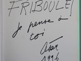 a close up of a book with writing on it