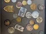 a picture of a shadow box filled with coins
