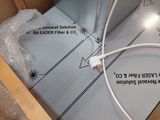 a box that has a computer in it on a table