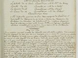 un vieux document sur lequel figurent des inscriptions et dans lequel se trouve un stylo