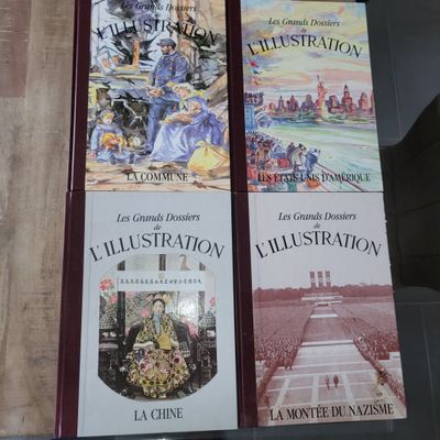 three books are sitting on a shelf next to each other