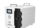 a white machine that is sitting on a white surface