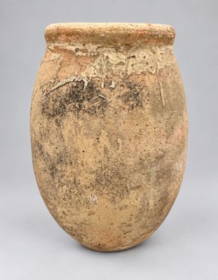 an image of a clay vase on a gray background