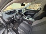 the interior of a car with a steering wheel and a dashboard