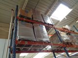 many boxes on the shelves in the warehouse