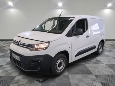 the white van is parked on a checkered tile floor