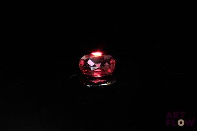 an image of a red diamond in the dark
