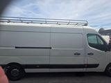a white van that is parked in a parking lot