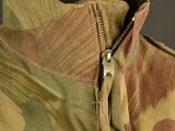 a close up of a jacket with a zipper on it