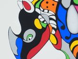 painting of a woman riding a horse with a colorful design on it
