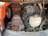 a small engine in the back of a truck