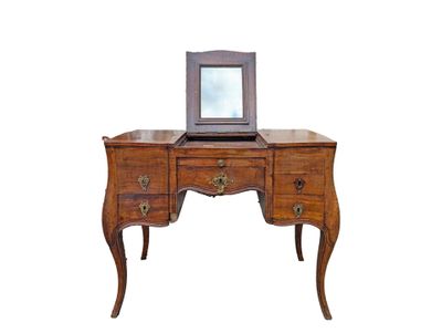 a small desk with a mirror on top of it