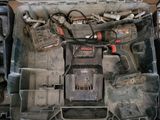 a tool box with tools in it sitting on the floor