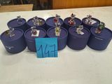 a lot of small figurines sitting on top of a table