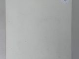 an image of a piece of white paper with a sticker on it