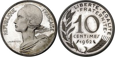 a close up of a coin with a woman ' s face on it