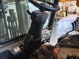 an image of a forklift driver in a warehouse