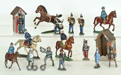 many figurines of soldiers on display on a shelf