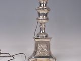 pair of antique silver plated candlesticks with lion heads