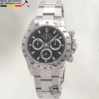 rolex watch with black dial and stainless bracelet on white background