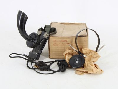 a box with a phone and a pair of headphones on it