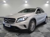 the mercedes gla suv is parked on a checkered floor