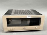 an image of a tan stereo amplifier sitting on top of a table