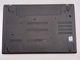 a black laptop that is sitting on a table